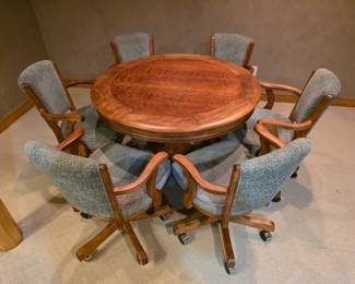Heavy duty, solid wood round table, with 6 very comfortable chairs. Poker/card table.