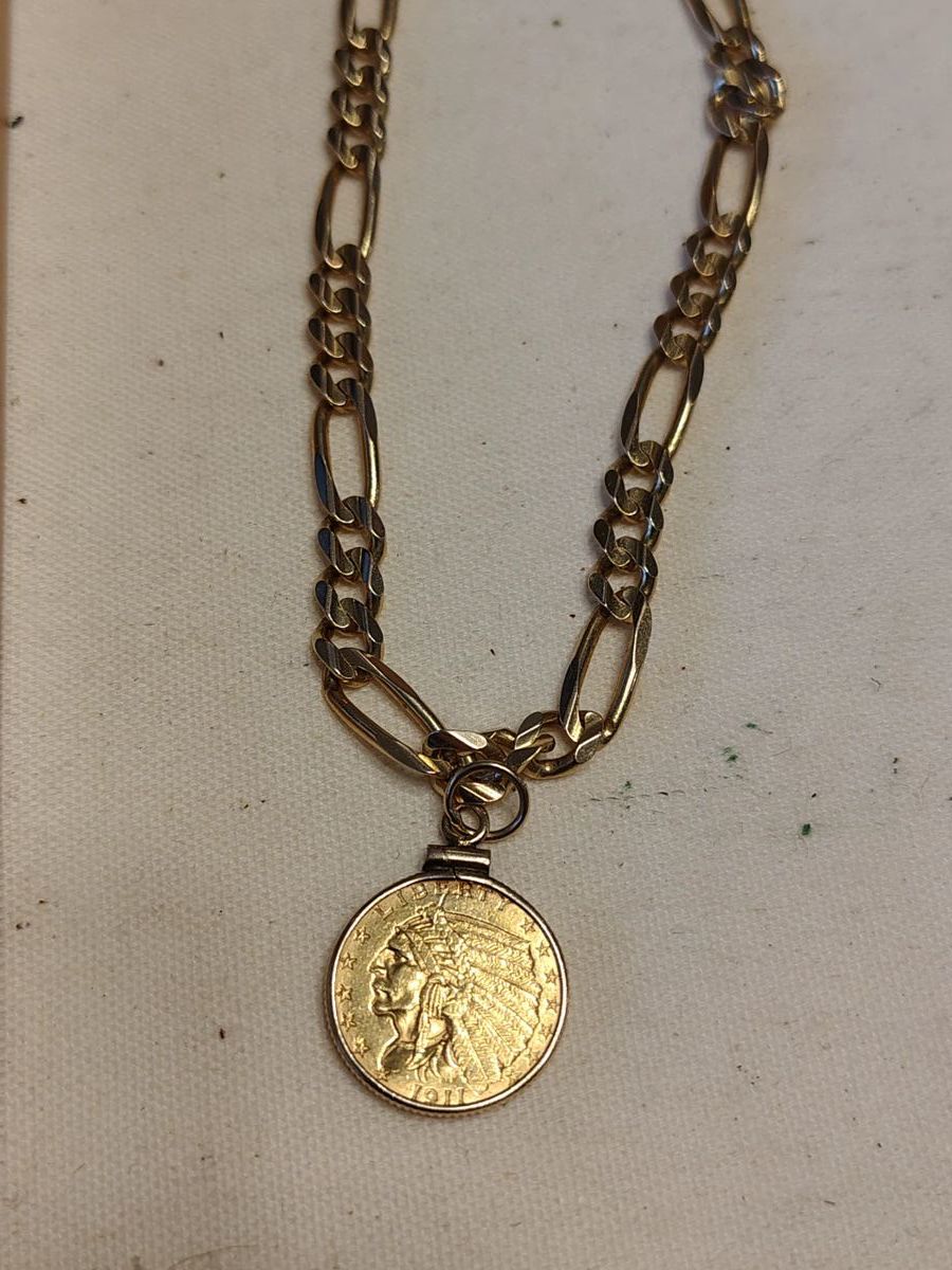 Huge 14kt chain with gold 2..5 dollar coin pendant.