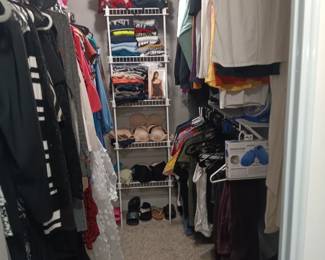 Closet full clothes.