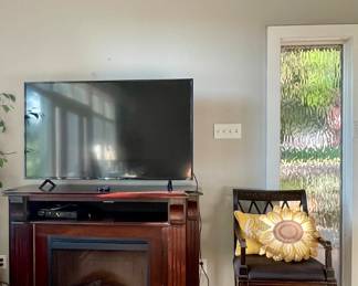 TELEVISION, ELECTRIC FIREPLACE, ACCENT CHAIR