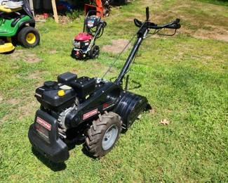 511.Craftsman 18in. dual direction rear tine tiller