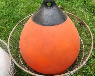 411.An orange Scanmarin and a white buoy