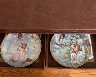 R52 - $50. Sandra Kuck "Always With You" Calendar. Includes wooden framed calendar with days & 12 plates with storage box. Calendar measures 10" wide x 26" tall. 