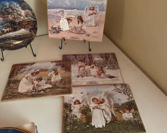 R25 - $20. Set of 4 Sandra Kuck's Heavenly Seasons. One has small chip on the back no visible when on display!