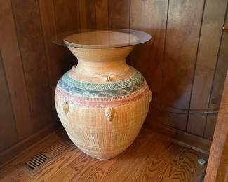 R50 - $50. Large Terracotta Planter that has been used as a side table with a piece of glass on top. Has one minor crack at the top - See photo. Measures 26" tall. 