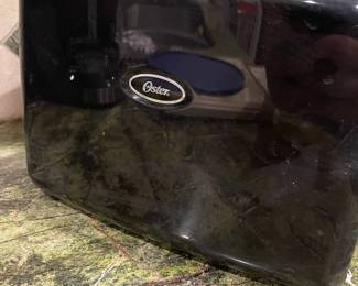 R59 - $10 Oster 4 Slot Toaster. 