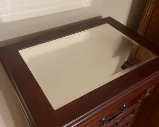 R49 - $100. Stand up Jewelry Box. Measures 18" wide x 12.5" deep x 42" tall. Sides open for necklaces. Drawers all slide. Mirrored top lifts up. In very good condition!