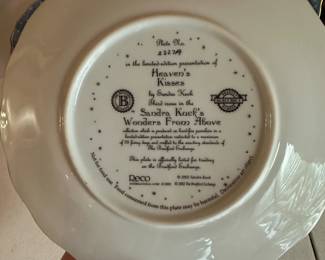 R27 - $20. Set of 4 Sandra Kuck plates "Wonders From Above". 