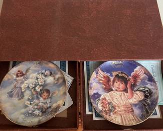 R52 - $50. Sandra Kuck "Always With You" Calendar. Includes wooden framed calendar with days & 12 plates with storage box. Calendar measures 10" wide x 26" tall. 