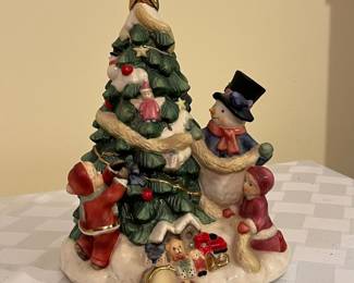 A10 - $25. "Trimming the Tree" Music Box Coyne's & Company. 8"Tall