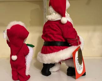 A13 - $25. 2 Pc Clothique. Santa 8.5"T, Child 6" T