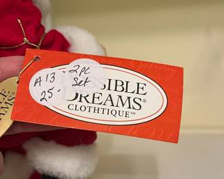 A13 - $25. 2 Pc Clothique. Santa 8.5"T, Child 6" T