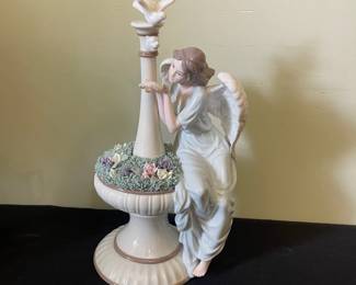 R93 - $25. Porcelain Angel Sculpture. Measures 13.5" tall. 