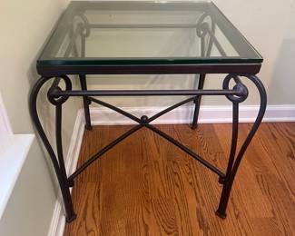 R24 - $35. Iron & Glass Side Table. Glass top is a 20" square x 22.5" tall. Iron frame is slightly wider than the top. 