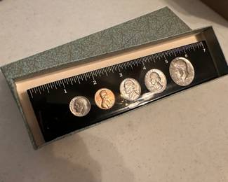 Coins in lucite ruler