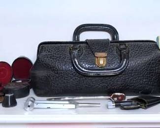 Doctors Bag With Lenses And Medical Equipment
