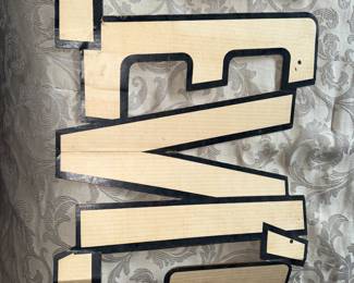 Close up of rare 1950-1960’s cardboard Levi’s advertisement from Bintz Sporting Goods Store. BIG E.