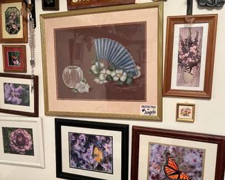 Framed photographs and original still life