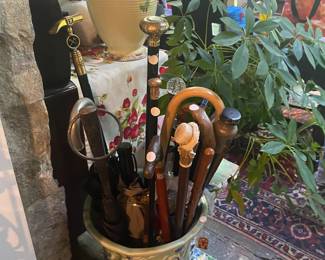 Multiple Antique and other Walking Sticks and Canes.