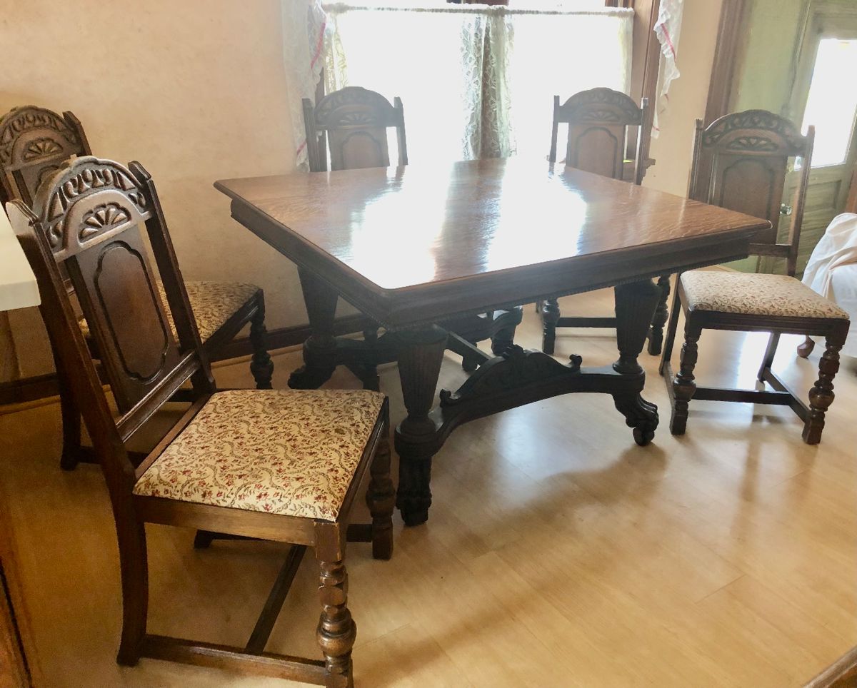 PRE-SALE NOW Bernhardt Furniture Company Table and 6 Chairs. Impressive, Intricate Carved Dining Set from quality Bernhardt Furniture Company, Jacobean / Revival Style Set includes a Square Table with Great Details, Beautiful Natural Stained Wood in Excellent Condition. Entire Set has the original finish, shows very little wear-and-tear (Very Well Taken Care Of). Table measures 50” Wide x 45” Long x 30” Tall.  6 Chairs fabric cushion covered in a neutral fabric. 1 Captain Chair has beautifully carved arms. Table & 6 Chairs $650                                                                ***Unbelievable Bundle Price for Entire Bernhardt Furniture Company, Jacobean / Revival Style Set Includes Table, 6 Chairs, Cupboard, Sideboard $1,500