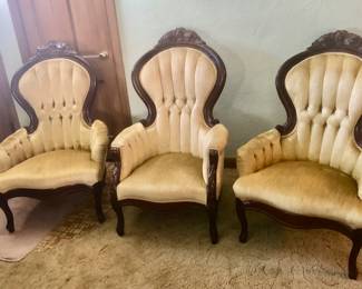 3 Carlton McLendon Gold Victorian Highback ArmChairs / Parlor Chairs with Mahogany Floral Carved Crest, Tufted back and low arms and Cabriole legs. 2 Matching Lady's and 1 Gentleman's (1 His and 2 Hers). 2 Matching Lady's Chairs are in very good condition with a little wear but No Stains, Rips or Tears measures 29" wide x 23.5" deep x 41" tall. The 1 Gentleman's Chair is in excellent condition (No Stains, Rips or Tears) measures 25.5" wide x 22" deep x 45" tall. We have a Detailed Receipt from Zollinger for the Reupholstering & Repadding of the Gents Chair where the owners paid $1,700 in 2004. $200 Each Chair *Unbelievable Bundle Price for All 9 Pieces of Carlton McLendon Victorian Furniture, Includes Sofa, 3 Chairs, Pair of Side Tables, Half Round Table, Oval Table, Plant Stand = $1500
