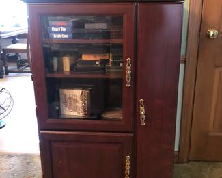 Entertainment / Media Cabinet  is 28” wide x 17” deep x 43.5” tall $35