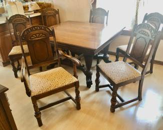 PRE-SALE NOW Bernhardt Furniture Company Table and 6 Chairs. Impressive, Intricate Carved Dining Set from quality Bernhardt Furniture Company, Jacobean / Revival Style Set includes a Square Table with Great Details, Beautiful Natural Stained Wood in Excellent Condition. Entire Set has the original finish, shows very little wear-and-tear (Very Well Taken Care Of). Table measures 50” Wide x 45” Long x 30” Tall.  6 Chairs fabric cushion covered in a neutral fabric. 1 Captain Chair has beautifully carved arms. Table & 6 Chairs $650                                                                ***Unbelievable Bundle Price for Entire Bernhardt Furniture Company, Jacobean / Revival Style Set Includes Table, 6 Chairs, Cupboard, Sideboard $1,500