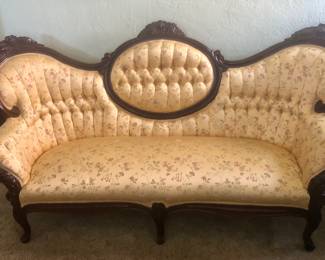 PRE-SALE NOW Carlton McLendon Victorian Parlor Sofa / Conversation Sofa. Mahogany Floral Carved Crest and Frame. Sofa measures 78.5” long x 34” deep x 39” tall. The Fabric is gold floral in perfect condition (No Stains, Rips or Tears), and the wood is in excellent condition. We have a Detailed Receipt from Zollinger for the Reupholstering & Repadding of the Sofa where the owners paid $2,700 in 2004. We are asking  $400 for Just the Sofa                                                            *Unbelievable Bundle Price for All 9 Pieces of Carlton McLendon Victorian Furniture, Includes Sofa, 3 Chairs, Pair of Side Tables, Half Round Table, Oval Table, Plant Stand = $1500