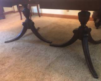 PRE-SALE NOW 1940’s-1950’s Mahogany Duncan Phyfe Rectangle Dining Table is 79.5 inches long (with one leaf that is 18 inches) by 42 inches wide and 29 inches tall. Table has twin 3 legged pedestal bases with traditional brass cap feet. Includes 6 matching chairs. The chairs are in very good condition with Famous Barr Labels. The table has a few scratches but it’s in good condition and has pads. Separate the 6 Chairs are $175 or Just the Table is $175, OR the Table & Chairs Together as a Set Only $300.