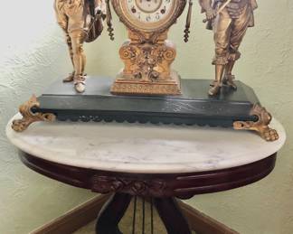 Carlton McLendon Oval Victorian Parlor Harp / Lyre Floral Carved Mahogany & Marble Table measures 28” long x 19” wide x 28” tall $165                                                                      *Unbelievable Bundle Price for All 9 Pieces of Carlton McLendon Victorian Furniture, Includes Sofa, 3 Chairs, Pair of Side Tables, Half Round Table, Oval Table, Plant Stand = $1500
