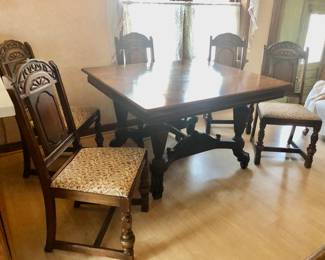 PRE-SALE NOW Bernhardt Furniture Company Table and 6 Chairs. Impressive, Intricate Carved Dining Set from quality Bernhardt Furniture Company, Jacobean / Revival Style Set includes a Square Table with Great Details, Beautiful Natural Stained Wood in Excellent Condition. Entire Set has the original finish, shows very little wear-and-tear (Very Well Taken Care Of). Table measures 50” Wide x 45” Long x 30” Tall.  6 Chairs fabric cushion covered in a neutral fabric. 1 Captain Chair has beautifully carved arms. Table & 6 Chairs $650                                                                ***Unbelievable Bundle Price for Entire Bernhardt Furniture Company, Jacobean / Revival Style Set Includes Table, 6 Chairs, Cupboard, Sideboard $1,500