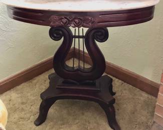 Carlton McLendon Oval Victorian Parlor Harp / Lyre Floral Carved Mahogany & Marble Table measures 28” long x 19” wide x 28” tall $165                           *Unbelievable Bundle Price for All 9 Pieces of Carlton McLendon Victorian Furniture, Includes Sofa, 3 Chairs, Pair of Side Tables, Half Round Table, Oval Table, Plant Stand = $1500
