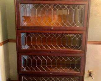 *PRE-SALE NOW Barrister Bookcase with Glass and Leaded Iron Fronts is 34 inches wide by 14 inches deep by 54 1/2 inches tall and it comes in 4 pieces (stacked). Has a little damage on the top right side. $375