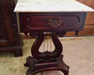 Pair of Matching Carlton McLendon Victorian Parlor Harp / Lyre Floral Carved Mahogany & Marble Lamp / Side Tables Measures 18” long x 14.5” wide x 29” tall $160 Each                                                                     *Unbelievable Bundle Price for All 9 Pieces of Carlton McLendon Victorian Furniture, Includes Sofa, 3 Chairs, Pair of Side Tables, Half Round Table, Oval Table, Plant Stand = $1500
