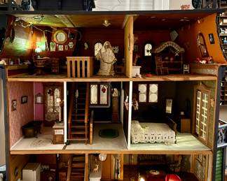 inside Victorian dollhouse furniture seen is included