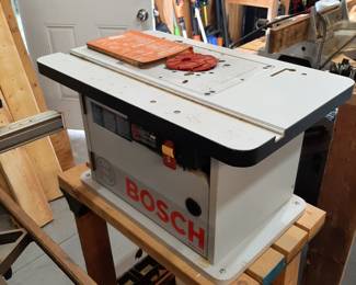 #46  Bosch Router w/Rolling Stand   $135