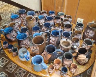 So many face mugs