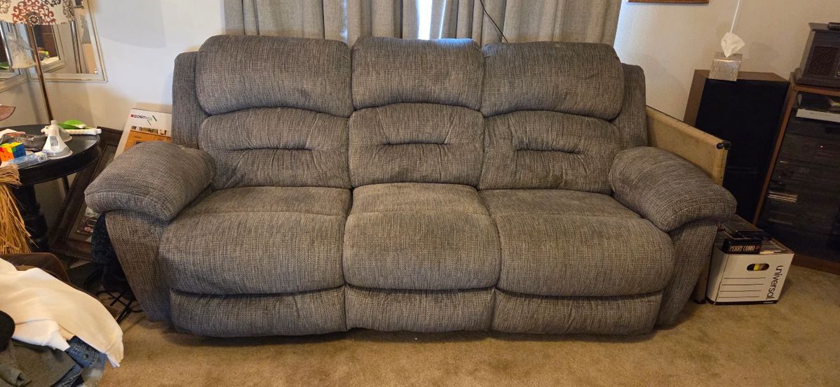 7.5' Gray Lazy-Boy Style Couch with dual recliners - in good condition. Purchased 2-3 years ago. 