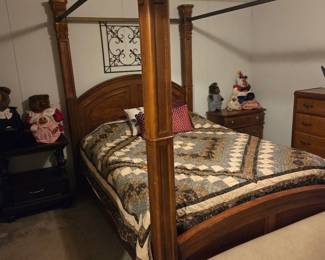 King Wooden 4-poster bed with mattress and linens. Side table 30"W with drawer. Bedside table 28"W with 3 drawers. Collectible wood-faced Raikes bears (Tyrone, Rebecca, Benjamin, Cupid, Bunny, Clown). Wall art. Faux leather upholstered bench. 