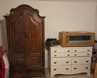 Large 42"W wooden armoire,  currently used for linen storage. Wooden dresser 50"W with 6 drawers. Seeburg select-o-matic 200 jukebox with 200+ 45 albums (not in current working condition). Small collection of 12" vinyls, as well. 