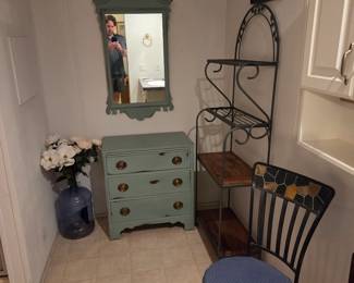 Light Green 28"W wooden 3-drawer dresser with matching mirror. Bakers Rack. Collapsible antique wooden side table. Outdoor patio chair with mosaic tile detail. 