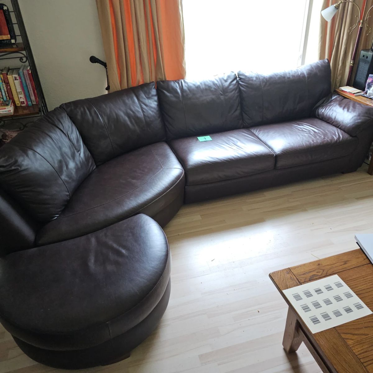 Lot #1 - Ikea Vreta Brown Faux Leather Sofa & Ottoman