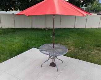 Lot #304 - Red 8ft Patio Tilt Umbrella with Metal Base and Round Table