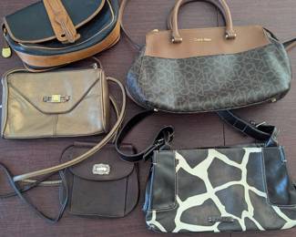 Lot #108 - Trendy Leather Handbags Collection - Including Calvin Klein, Dooney & Bourke, & Fossil