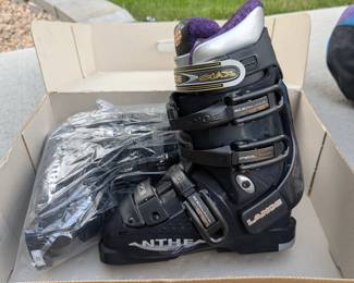 Lot #314 - New in Box Lange Anthe 7 Ski Boots and Bolle Kids Snowboard/Ski Helmet, Plus Ski Bag and Poles