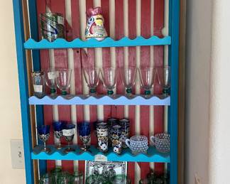 Folk Art shelf and misc shot glasses 