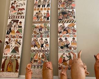 Tile plaques are in Ex Voto style.  There is a selection of terra cotta rabbits.