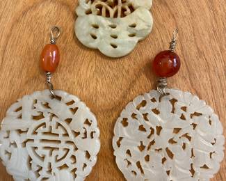 Three nice pieces of Jade. One has people images