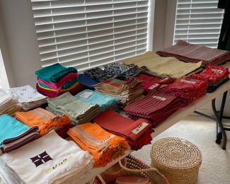 Table full of cloth napkins and place mats