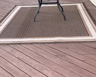 Patio table and outdoor rug